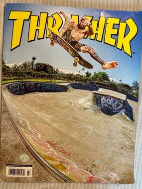 Thrasher Yellow Logo with Skateboarder Launching Over Bowl
